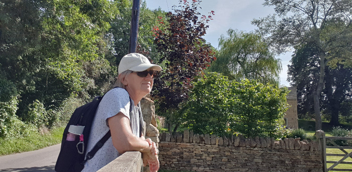 marlene leaning on fence