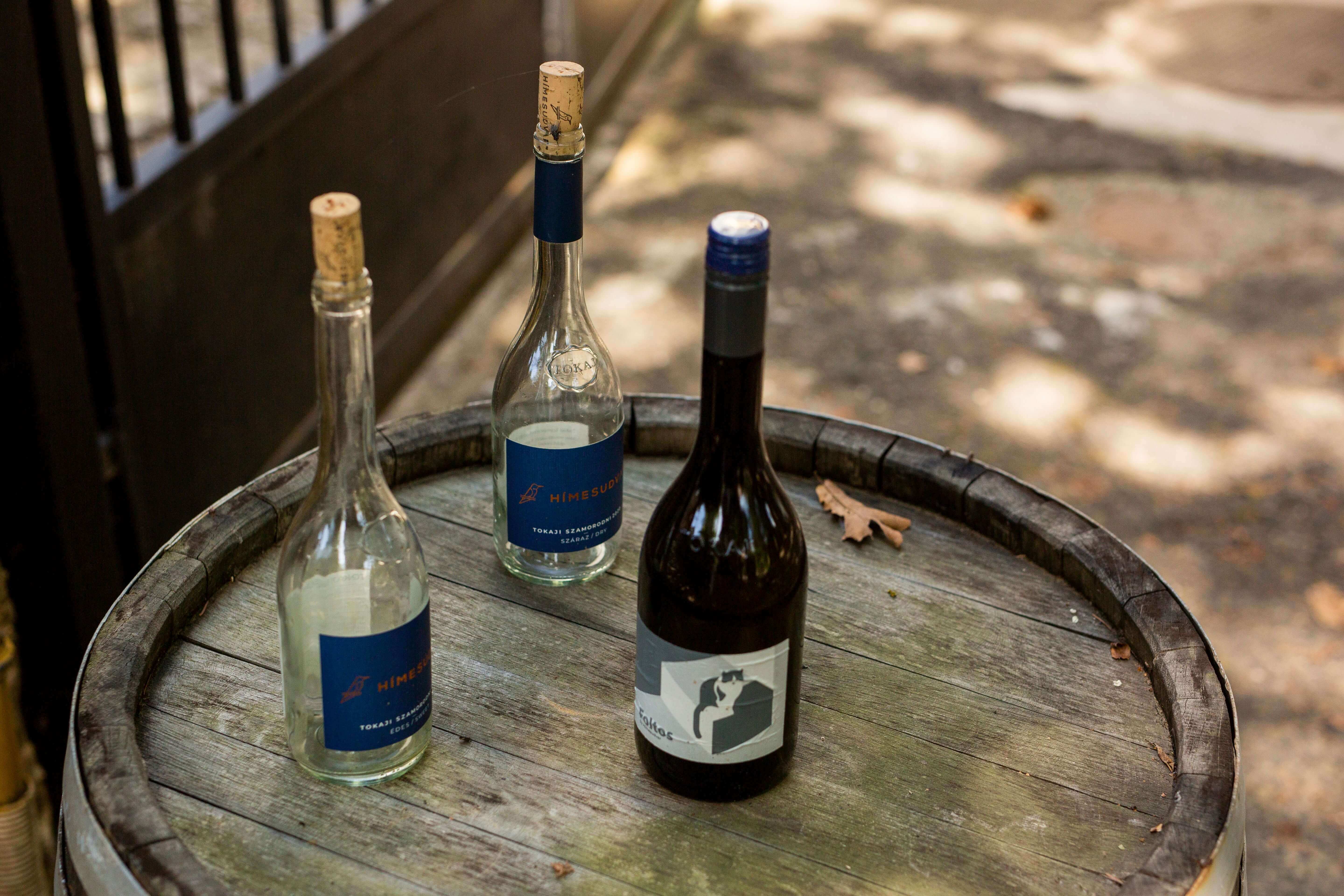 Three wine bottles from a wine tasting session in Tokaj