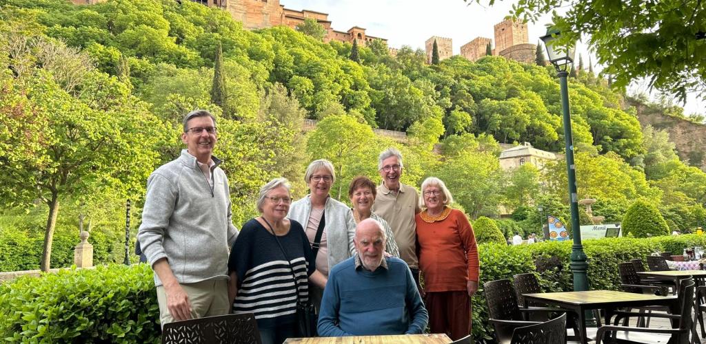 Smiling group with Alhambra in background