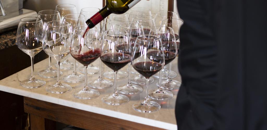 wine being poured into glasses