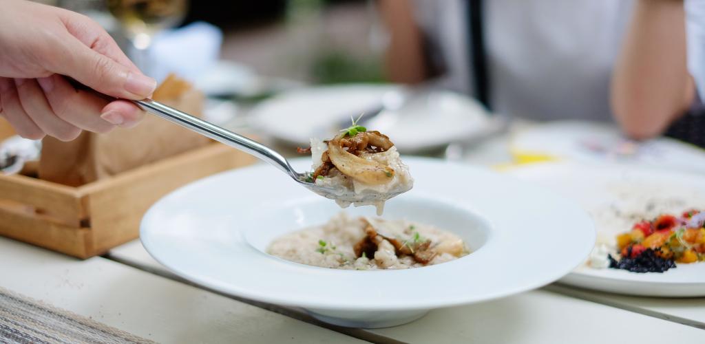 scoop of mushroom risotto with truffles